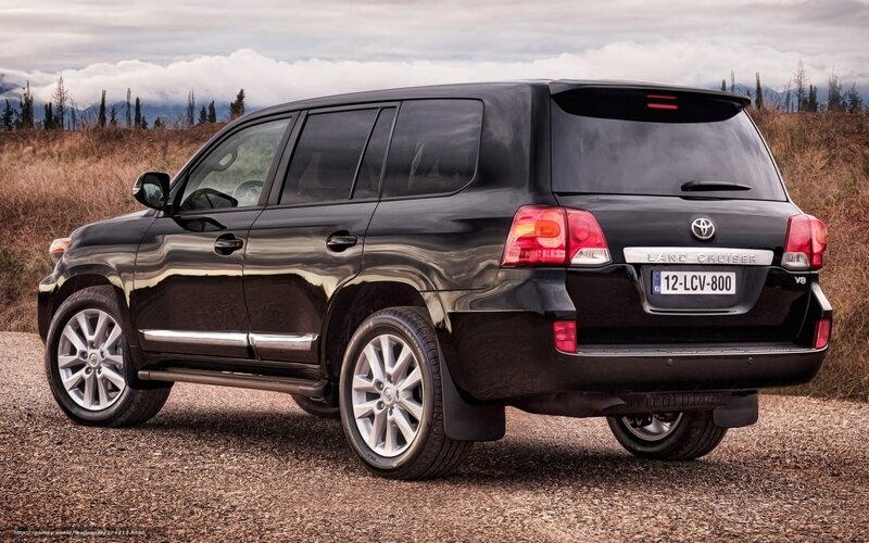 Black Toyota Land Cruiser — Dramatic, Photograph, Mountains