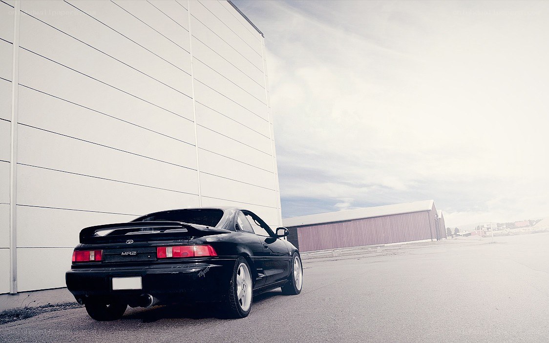 black toyota mr2 parked outside