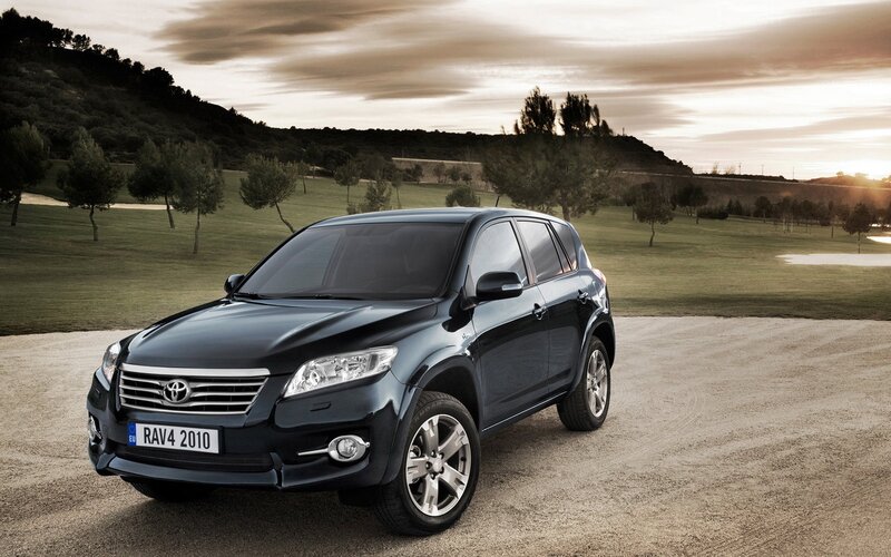 Black Toyota RAV4 on gravel