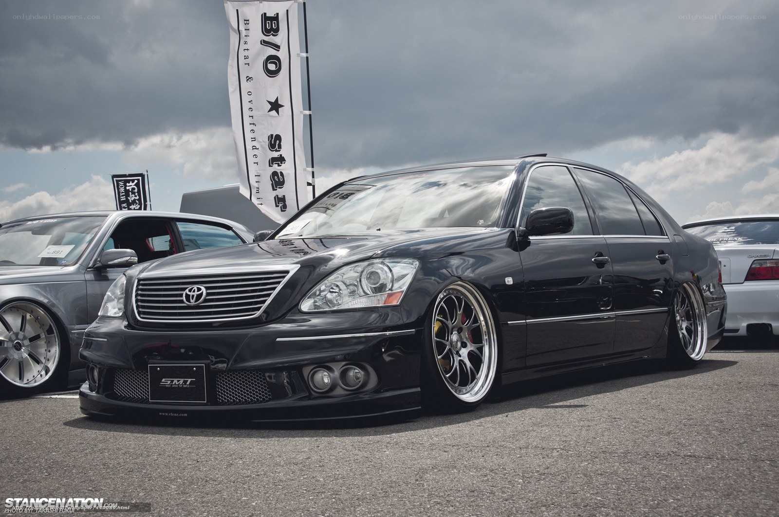 Black Toyota sedan at car show