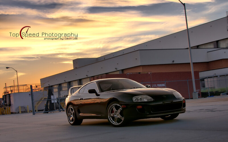 Black Toyota Supra at sunset