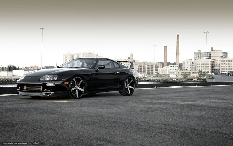 Black Toyota Supra on a city street