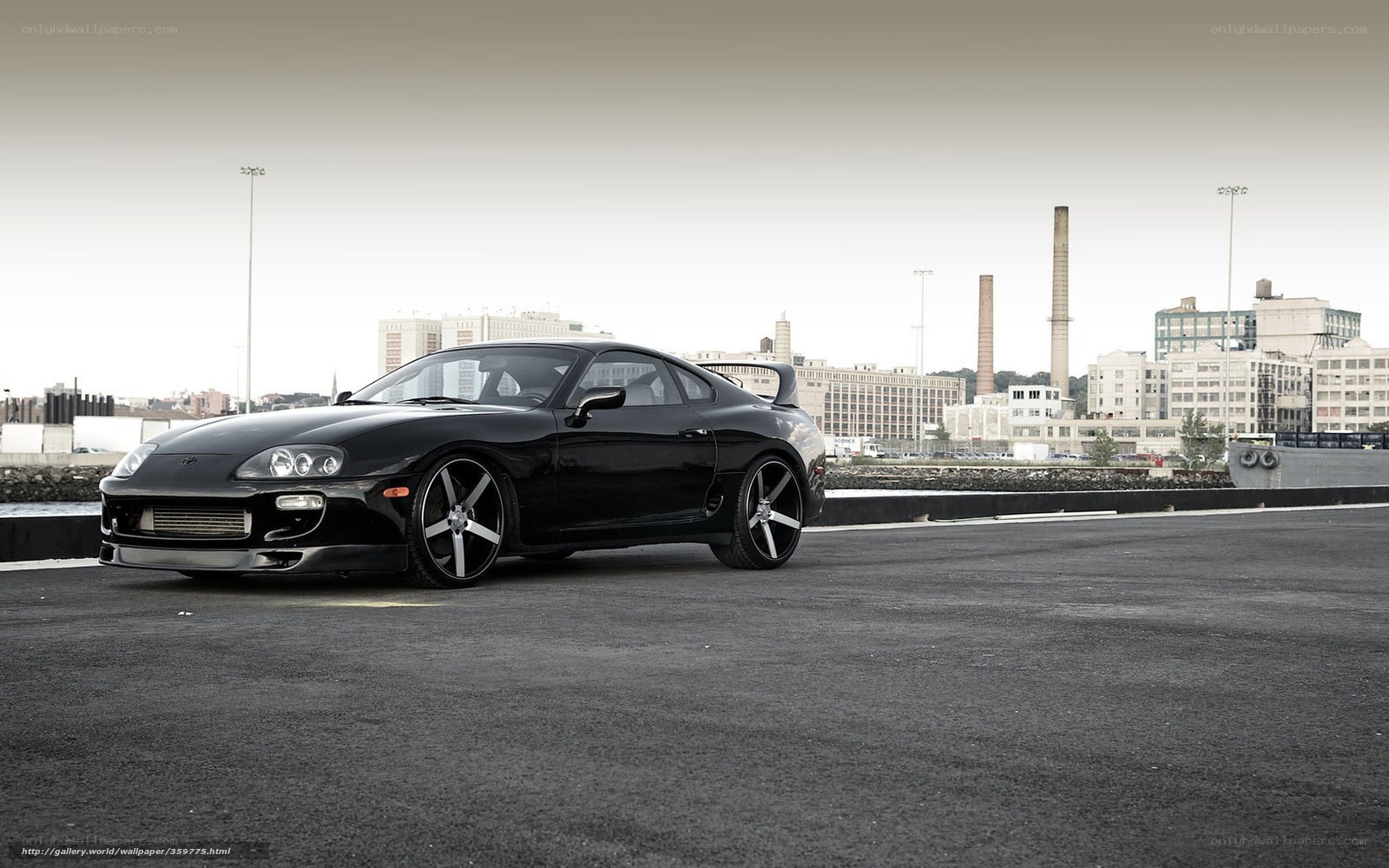Black Toyota Supra on a city street