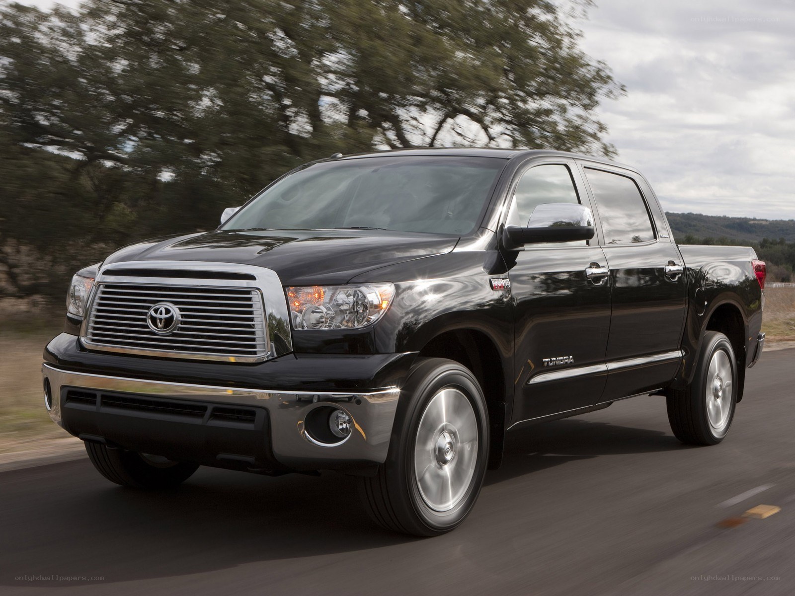 Black Toyota Tundra in motion