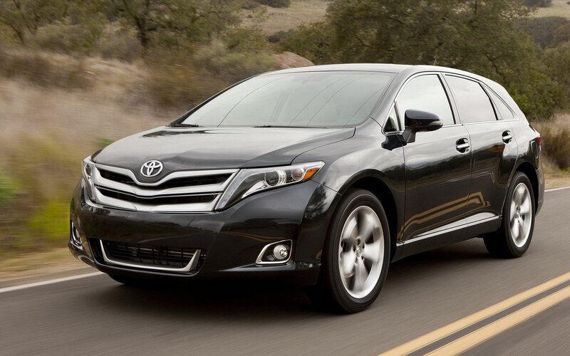 black toyota venza in motion