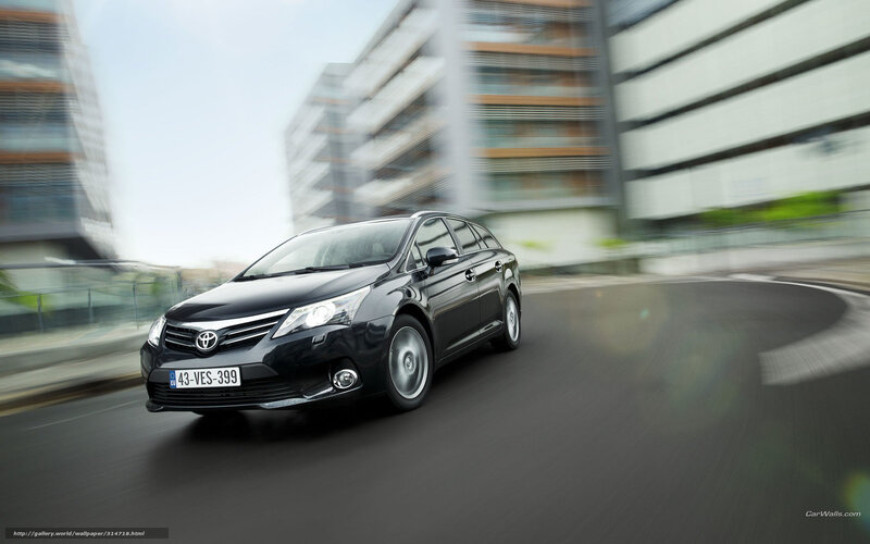 Black Toyota Venza in motion