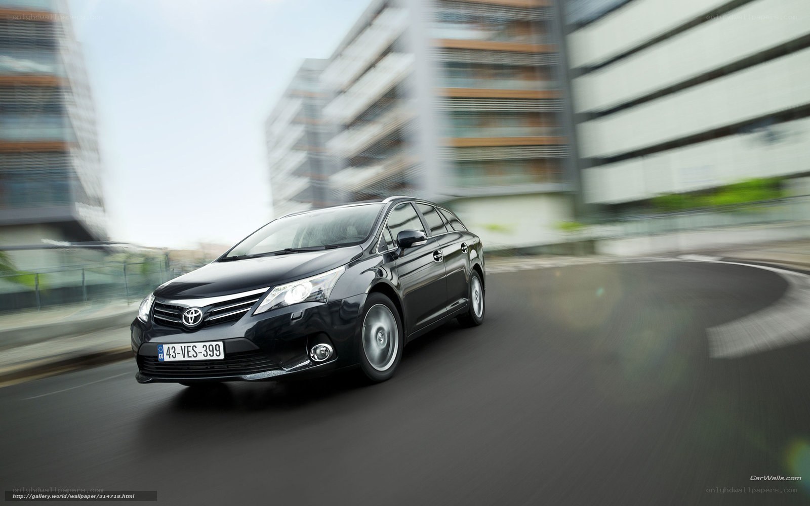 Black Toyota Venza in motion