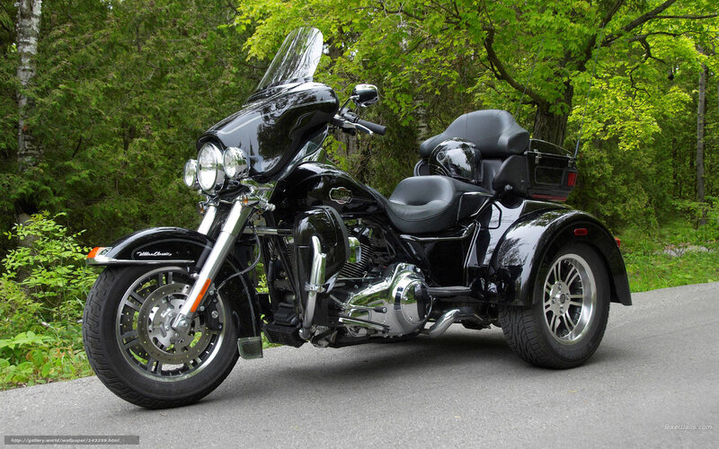 black trike motorcycle on road