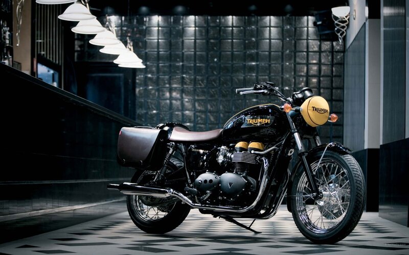 Black Triumph motorcycle in showroom