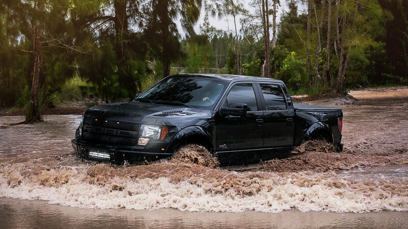 black truck in muddy water