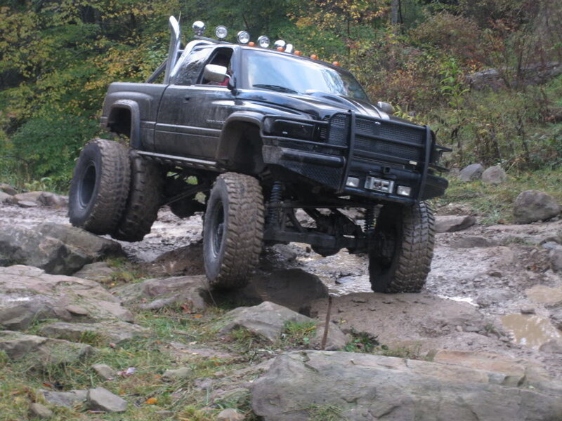 Black truck on rocky terrain
