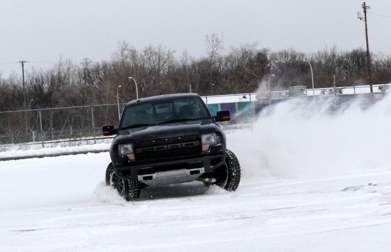 Black truck on snowy track