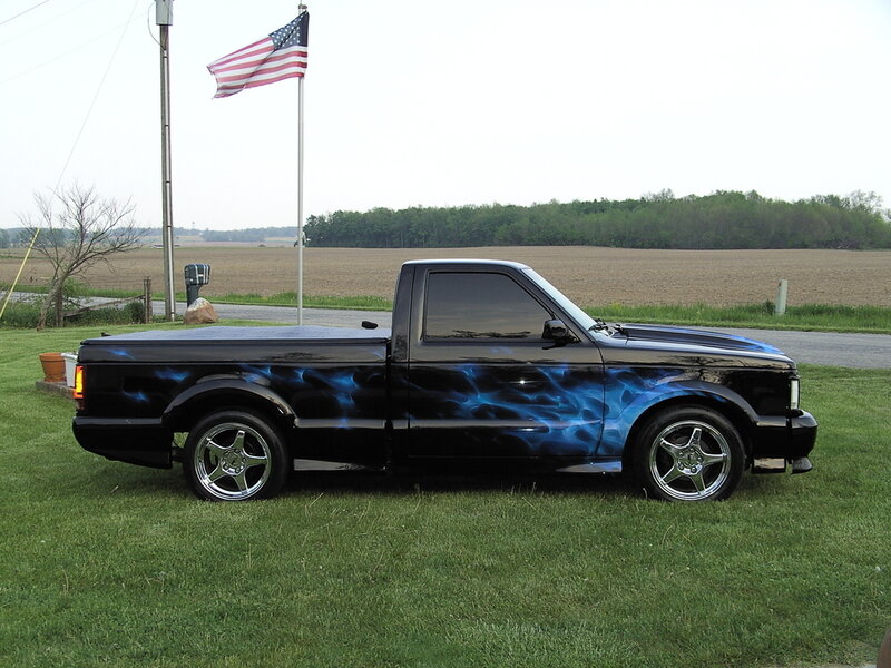 black truck with flame design
