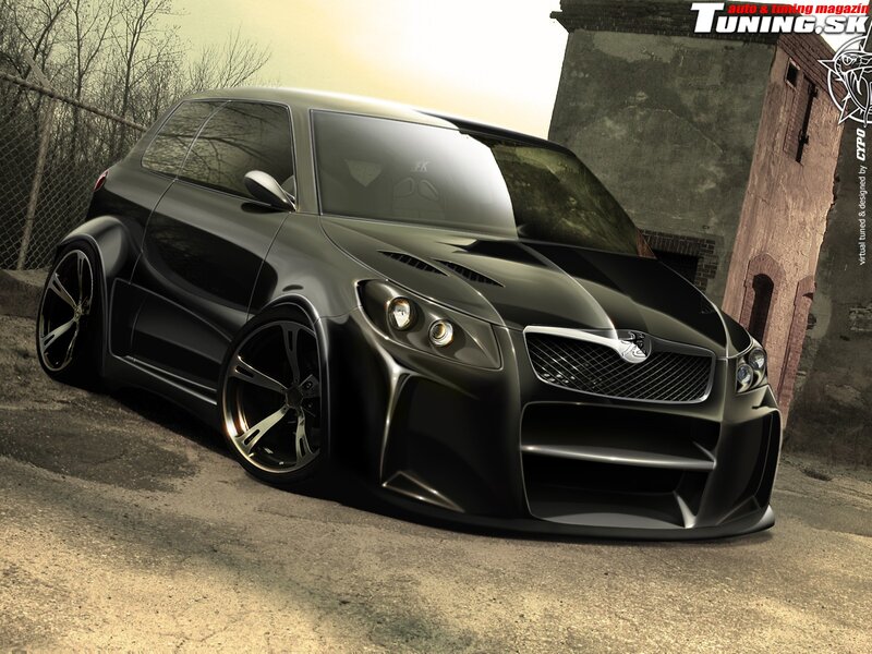 black tuned car in urban setting