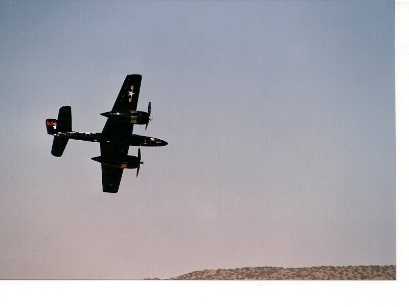 Black Twin-engine Plane — Blue, Calm