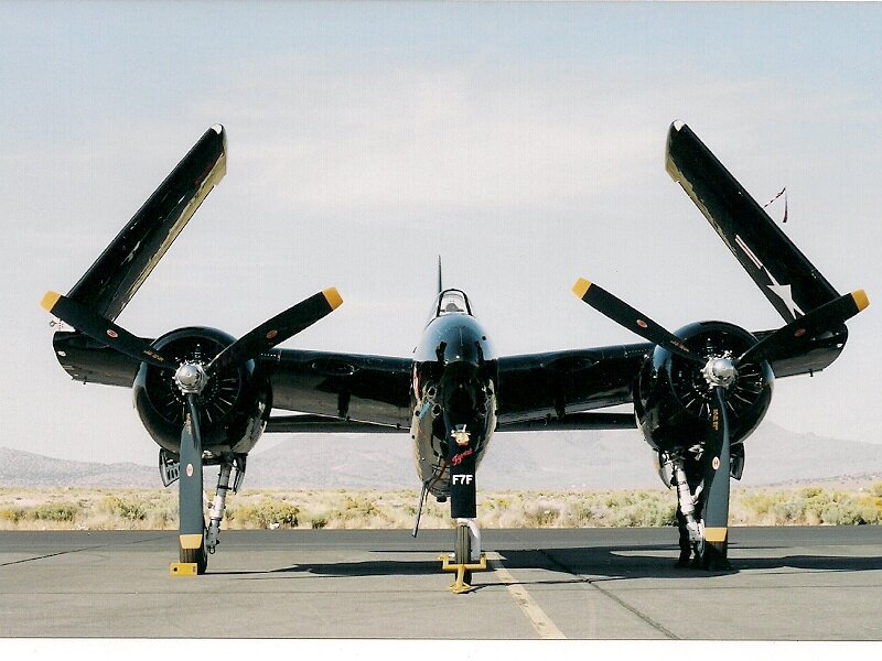 Black Twin-engine Plane — Calm