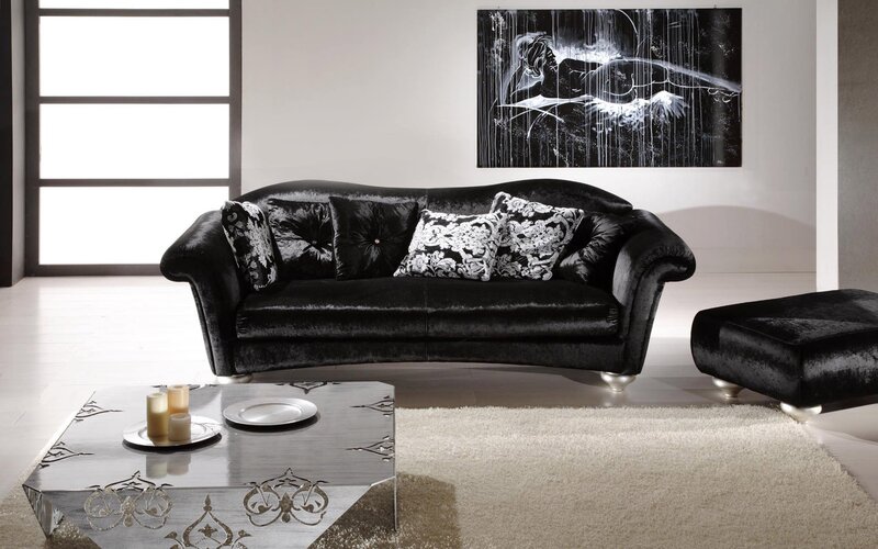 Black velvet sofa in modern living room