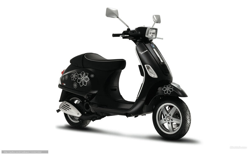 Black Vespa scooter with floral decals