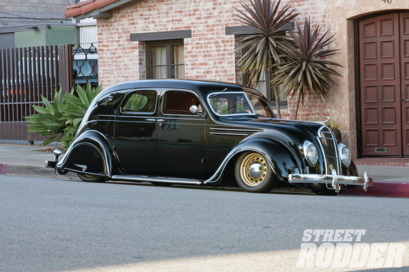 Black Vintage Car — Calm, Afternoon, Photograph, Brick Building