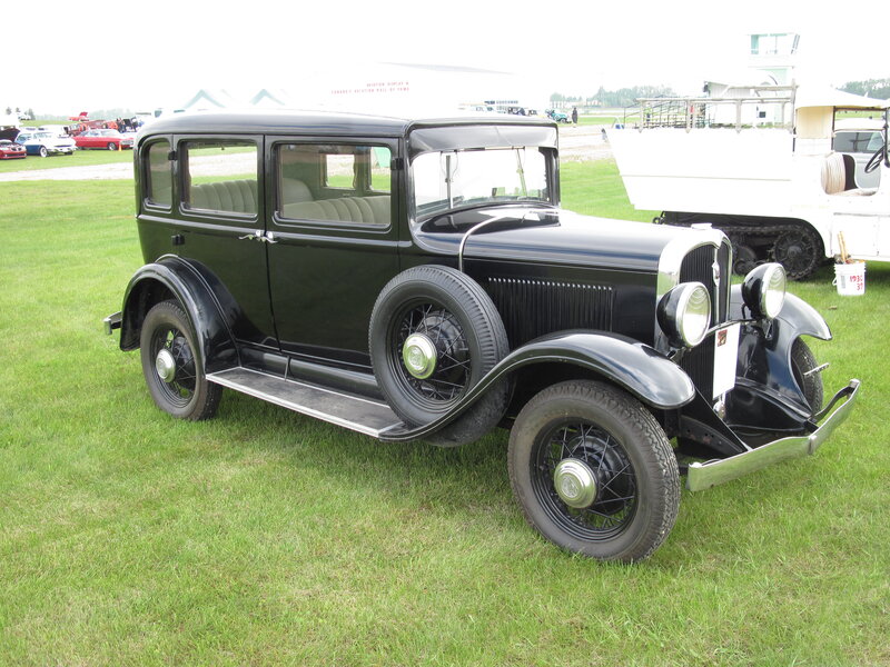 Black Vintage Car — Calm, Afternoon, Photograph, Grass Field