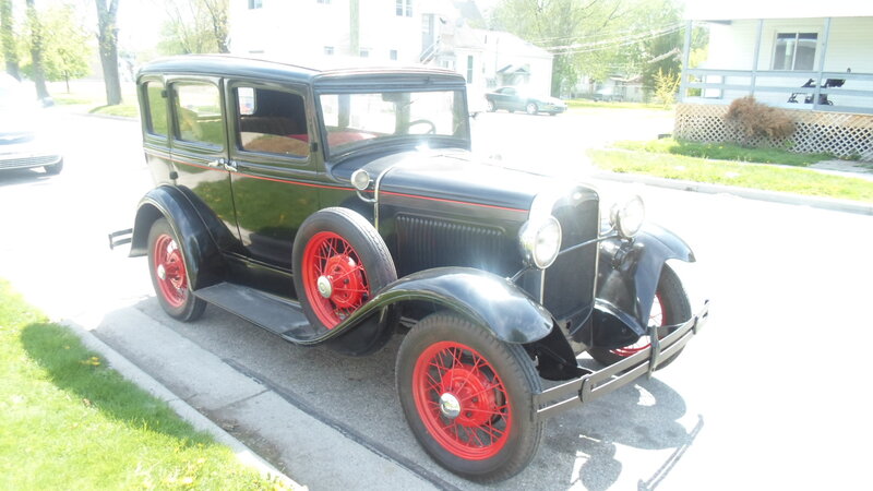 Black Vintage Car — Calm, Afternoon, Photograph, Red Wheels, Grass