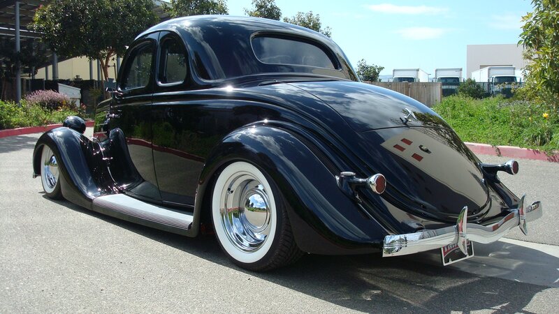 Black Vintage Car — Calm, Afternoon, Photograph, Trees, Buildings