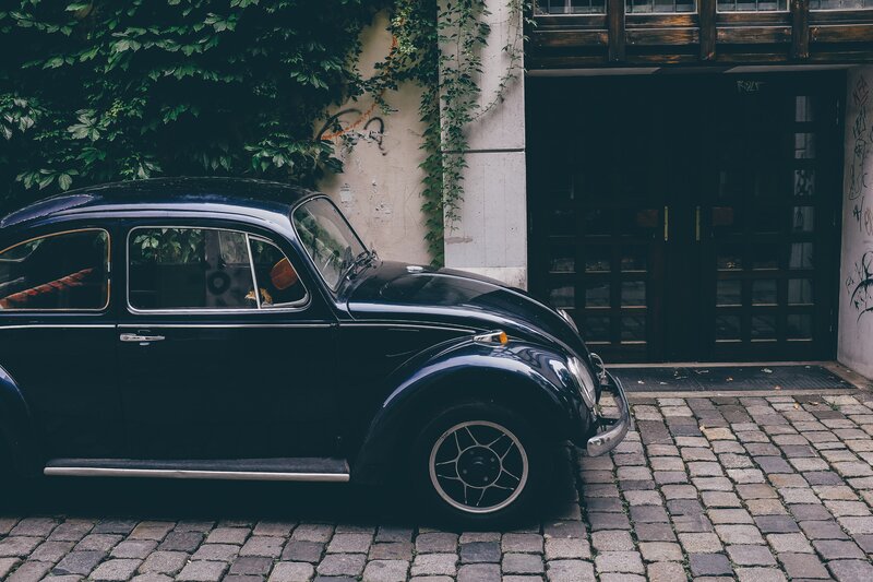 Black Vintage Car — Calm, Photograph, Cobblestone Street