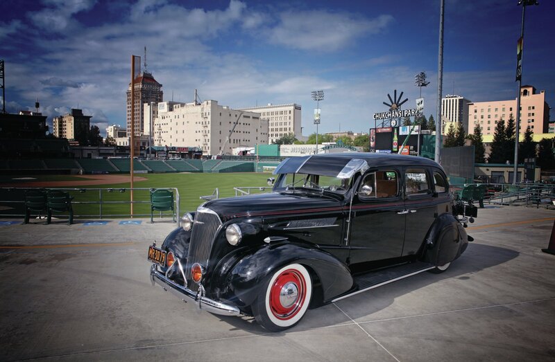 Black Vintage Car — Dramatic, Afternoon, Photograph, Baseball Stadium