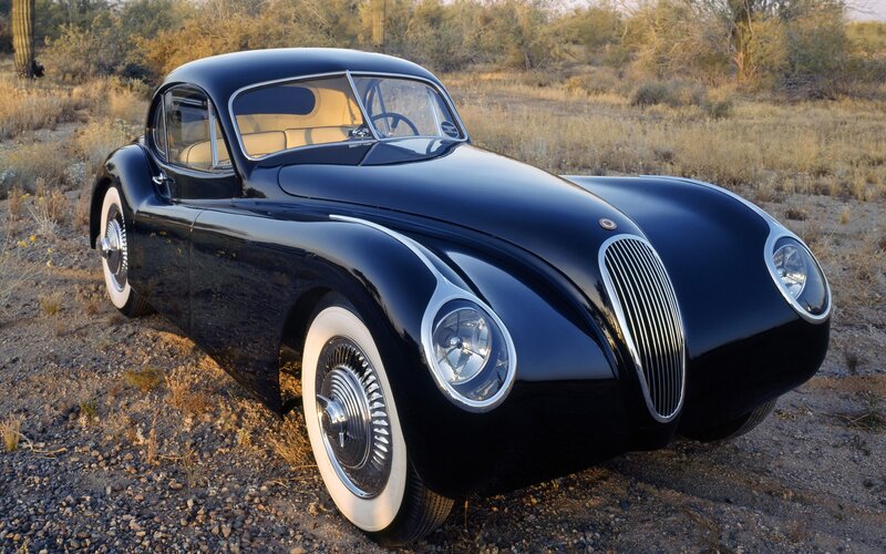 Black vintage car in desert