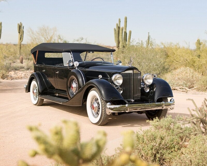 Black vintage car in desert