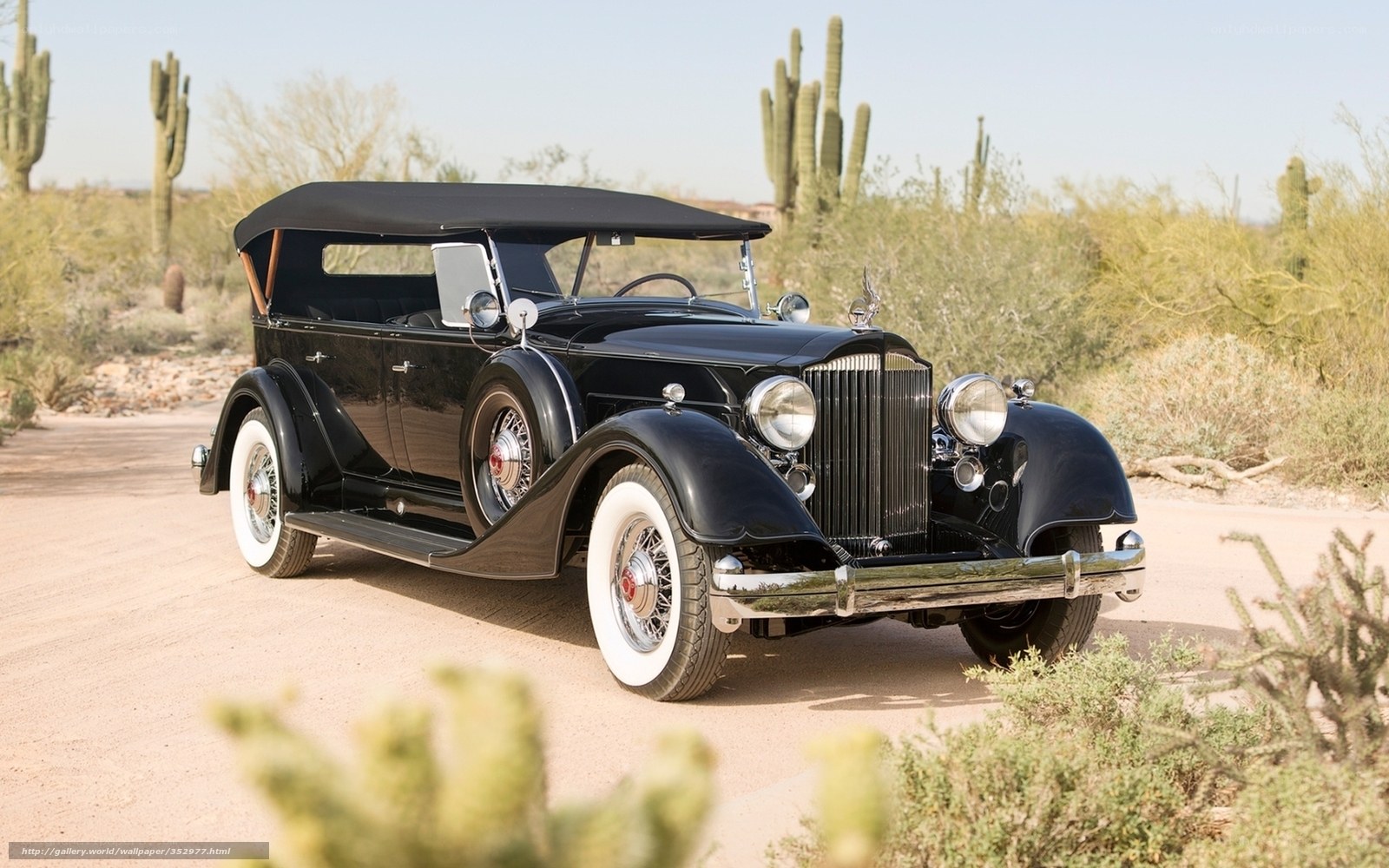 Black vintage car in desert