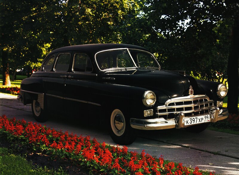 Black vintage car in garden
