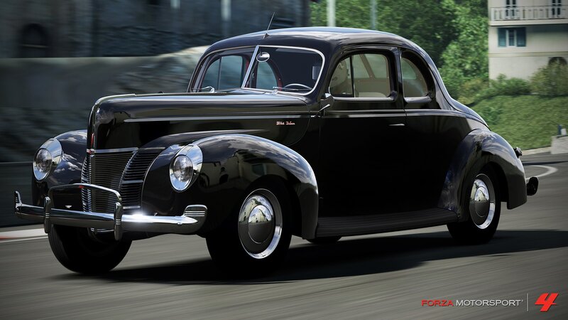 black vintage car in motion