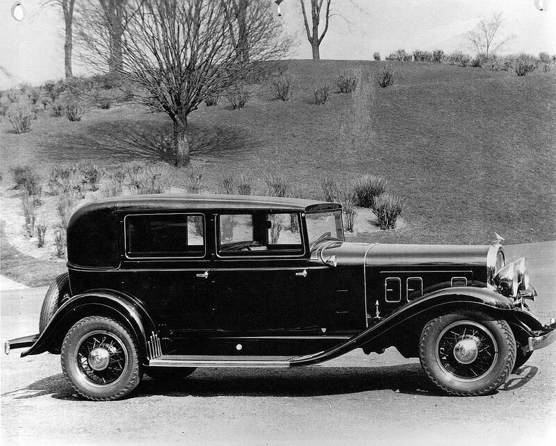 Black vintage car on a hill