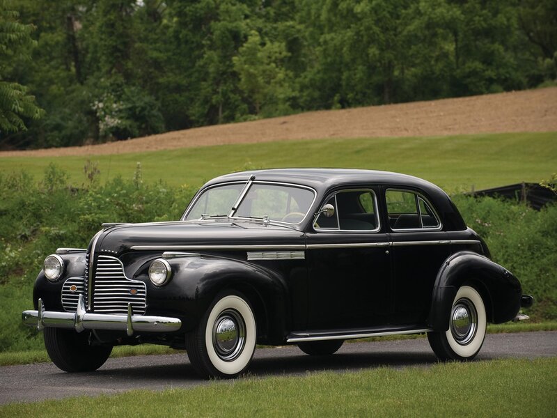 Black vintage car on a road