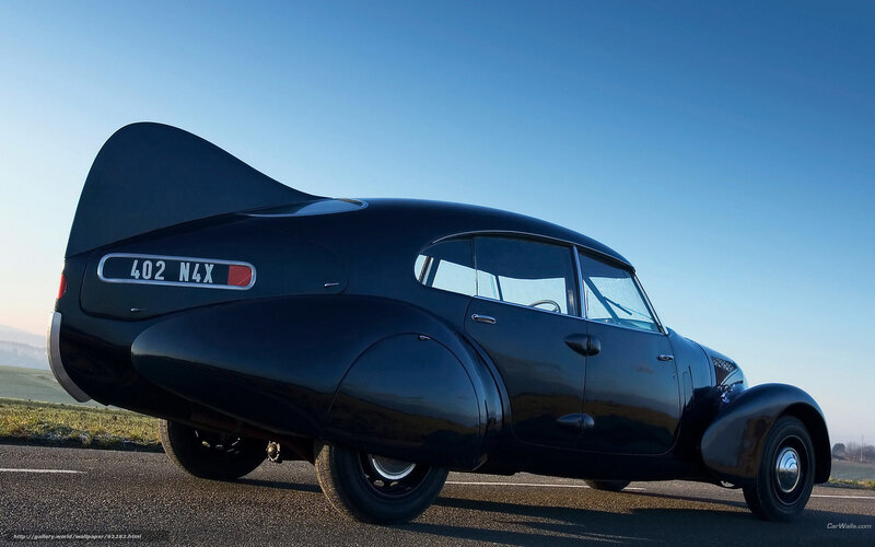 Black vintage car on road