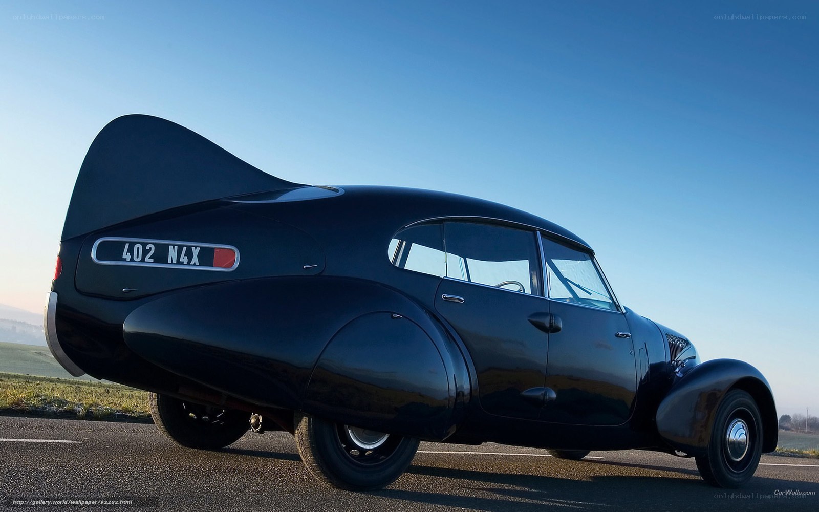 Black vintage car on road