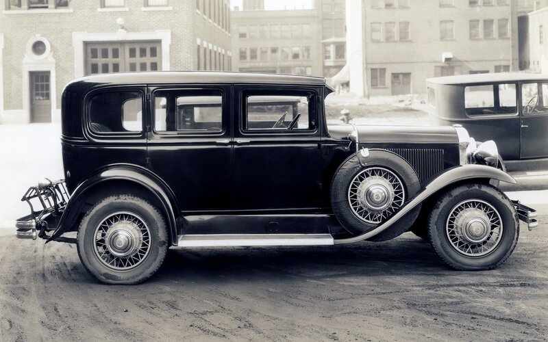 Black vintage car on street