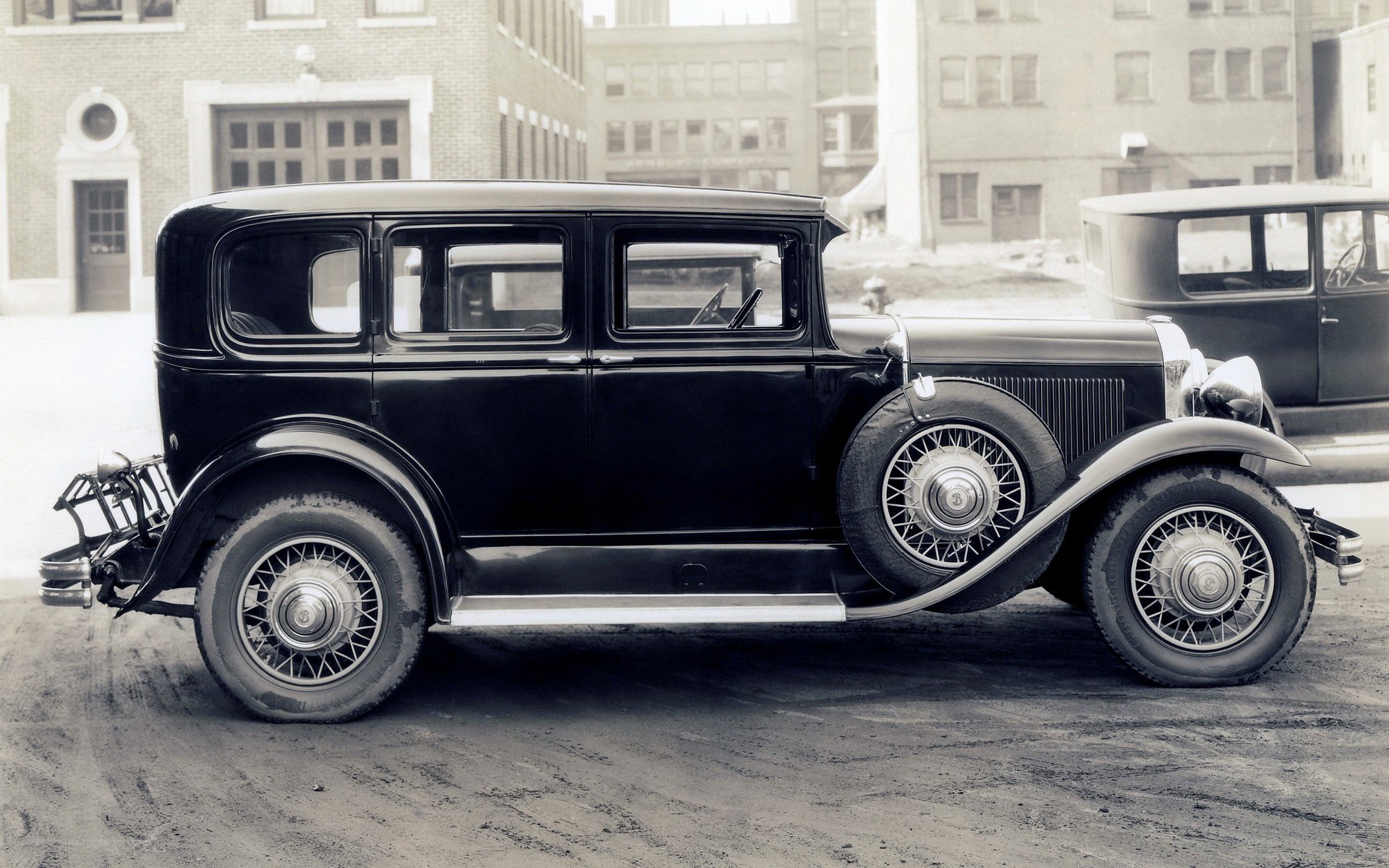 Black vintage car on street