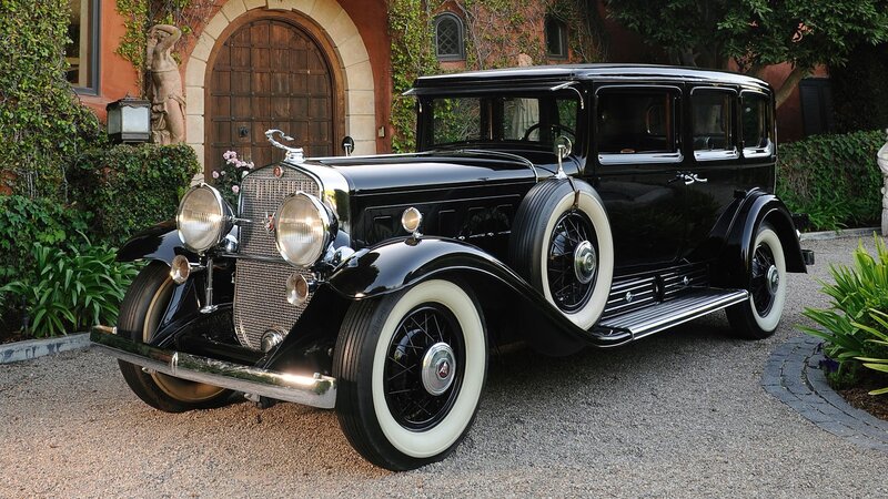 Black Vintage Car — Serene, Afternoon, Photograph, Statue, Building