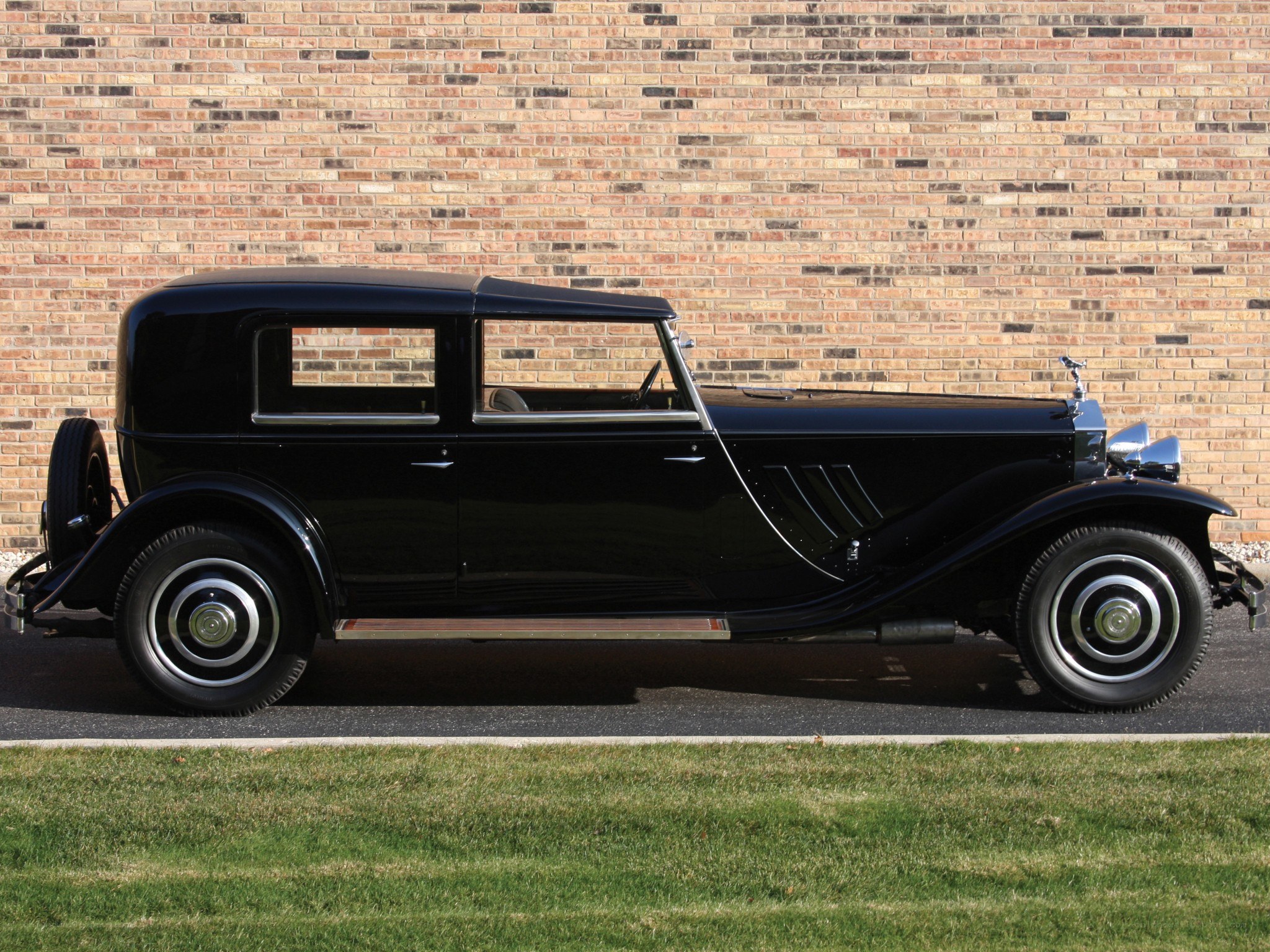 Black vintage car side profile