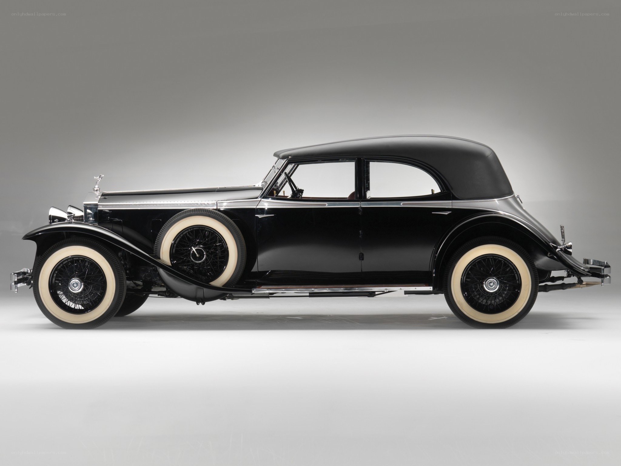 Black vintage car side profile