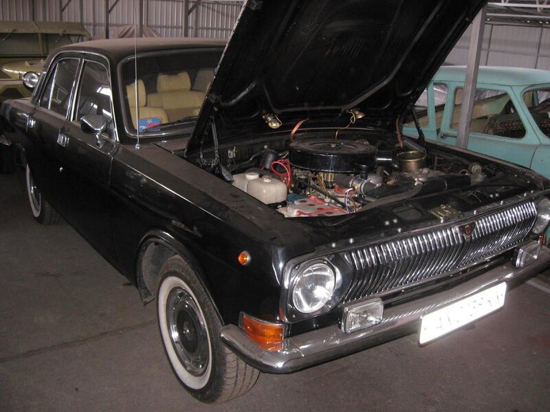 Black vintage car with open hood