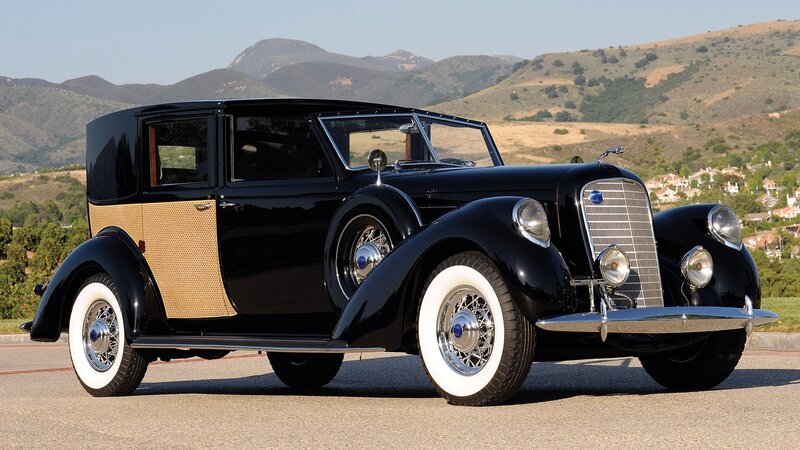 Black vintage car with wood paneling