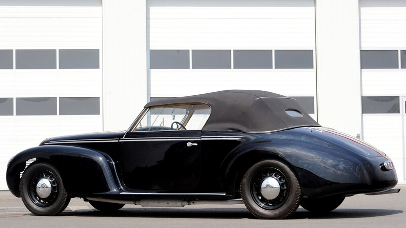 Black Vintage Convertible — Calm, Afternoon, Photograph, Car, Building
