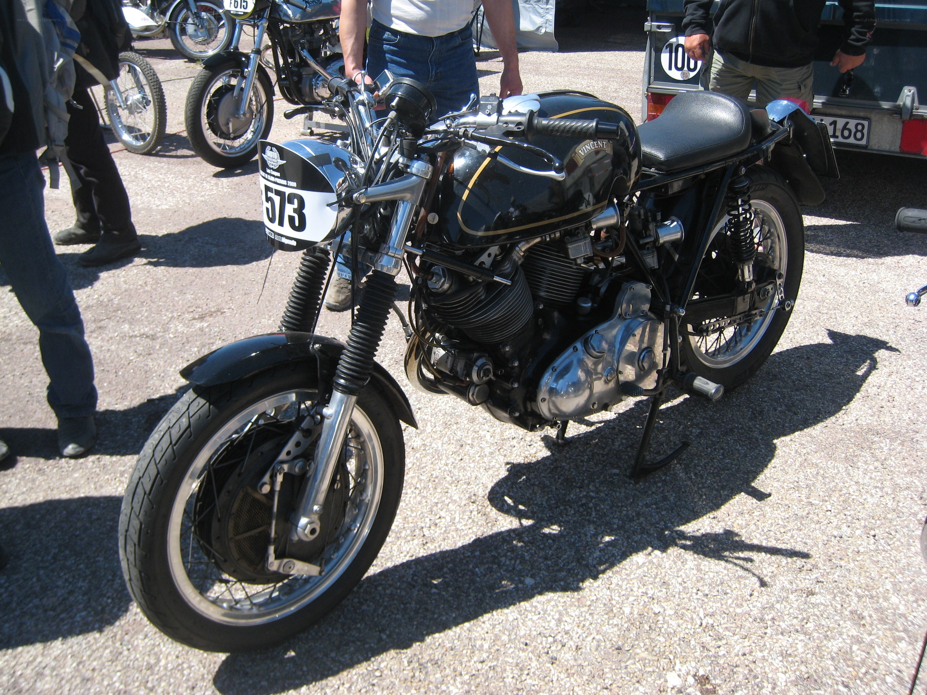 black vintage motorcycle on display