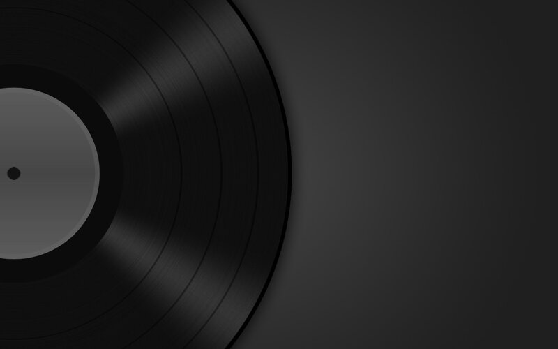 black vinyl record on dark background