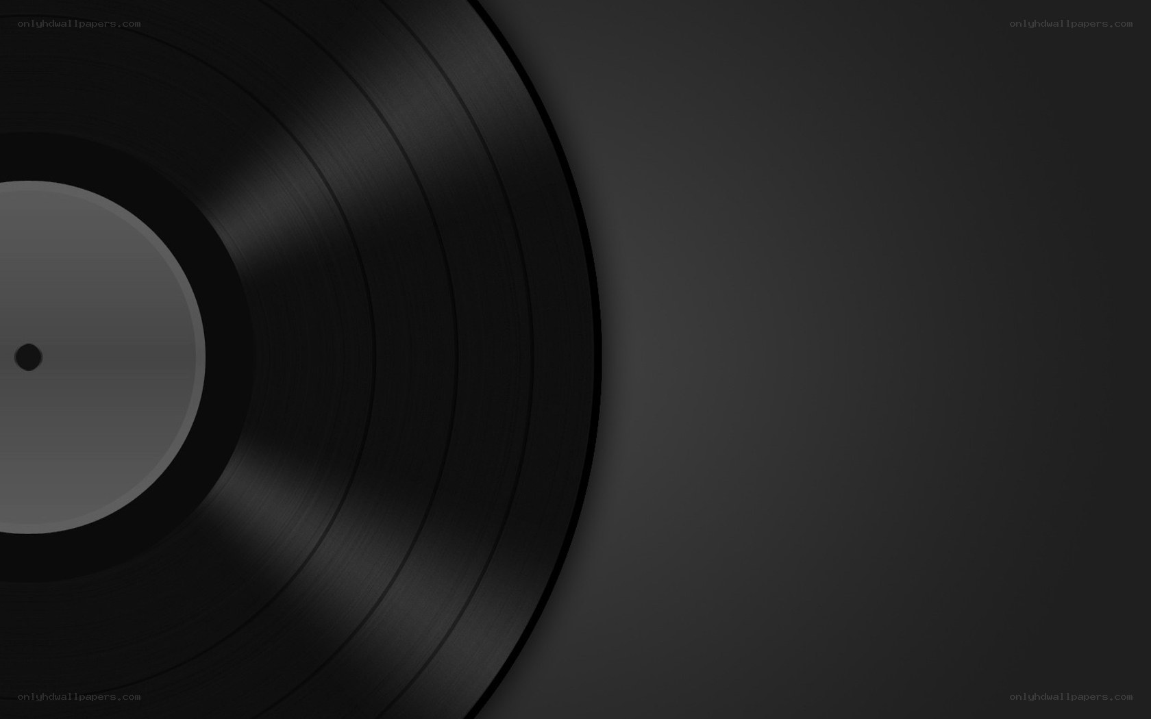 black vinyl record on dark background