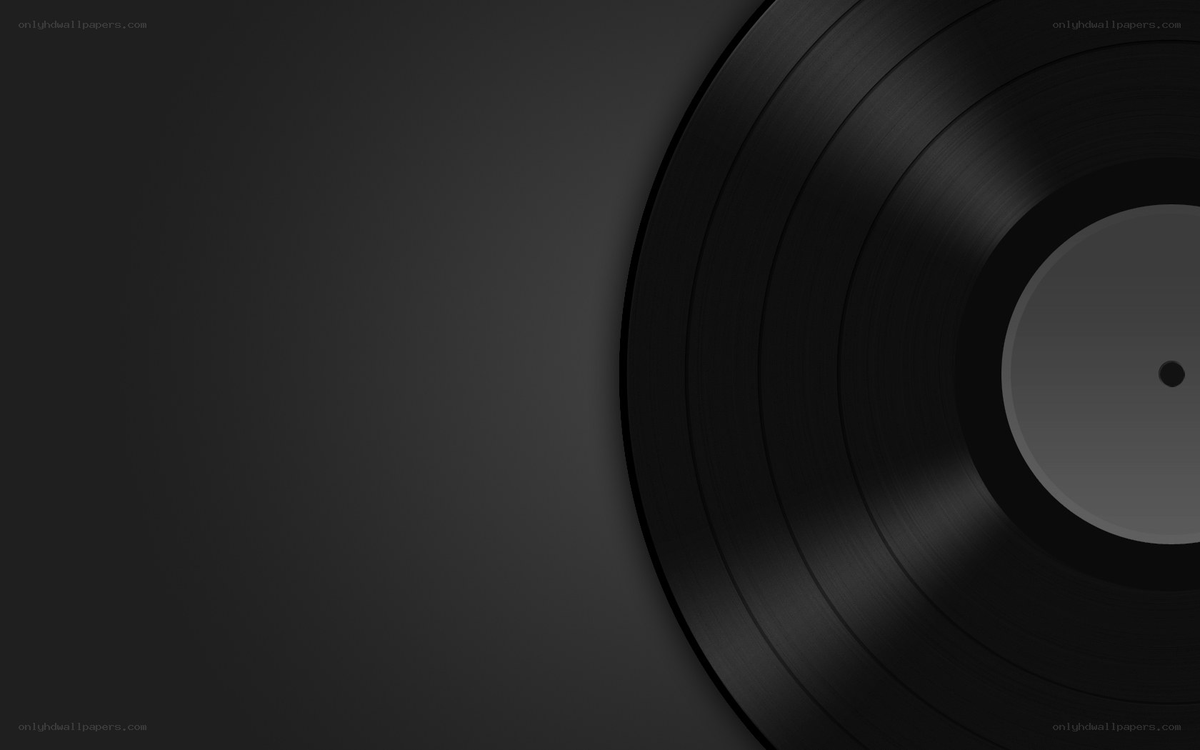 black vinyl record on dark background