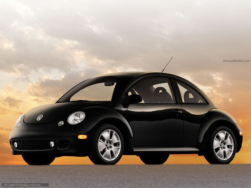 Black Volkswagen Beetle at sunset